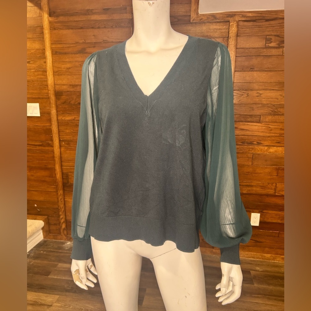 Reitman‘s signature size large, dark, green, unique sweater semi sheer arms